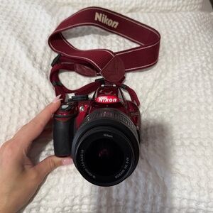 Nikon Burgundy DL3100 Camera with chargers